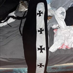 Fashion Nova Black and White Sweatpants with Cross Design